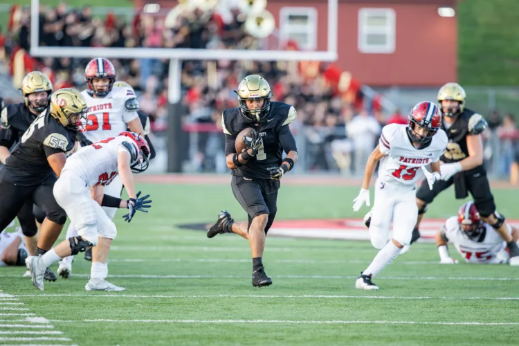 UHS scores twice on defense, runs past Washington, 56-7